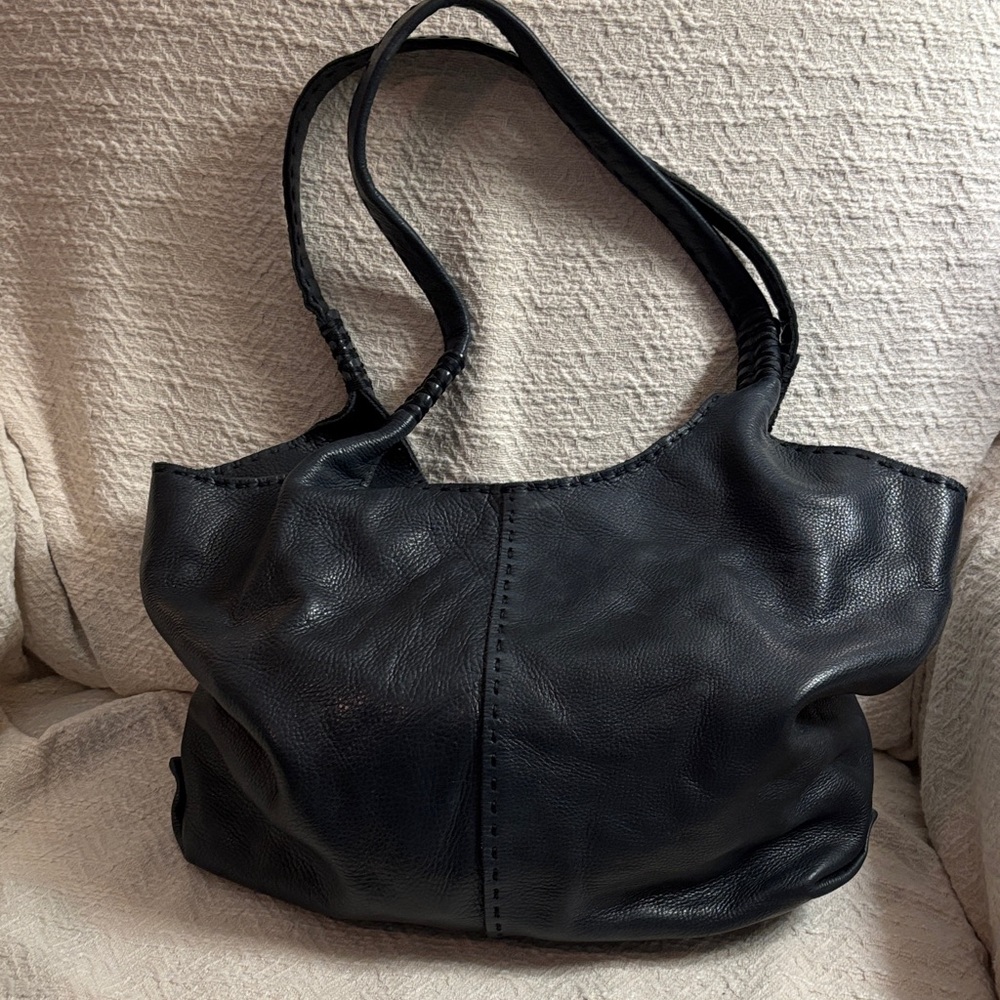 Frye navy leather bag with magnetic closure, gold accents only inside.
